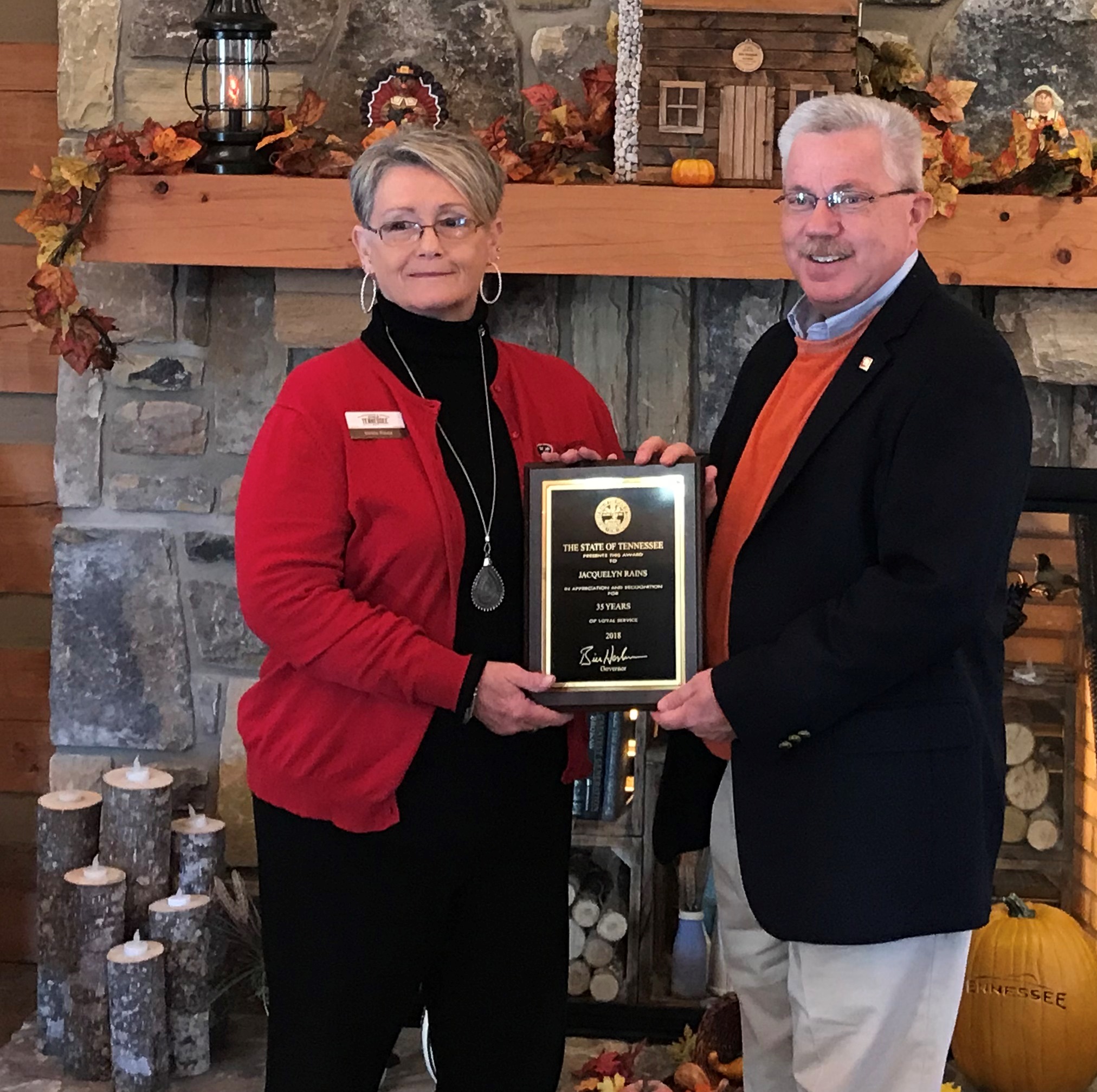 Commissioner Triplett presented Jackie Rain with a 35-year service plaque. 