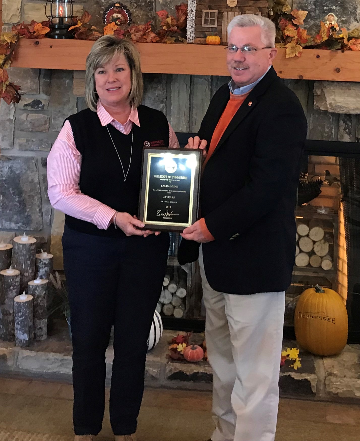 Commissioner Triplett presented Laura Munn with a 35-year service plaque.