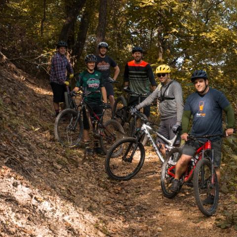 Amazon Prime’s “Air, Water, or Land” crew on mountain bikes in Northeast Tennessee.