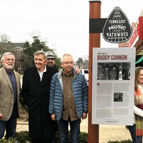 Buddy Cannon, first from left of TN Music Pathways sign, was honored in Lexington for his accomplishments as a Grammy Award-winning songwriter.